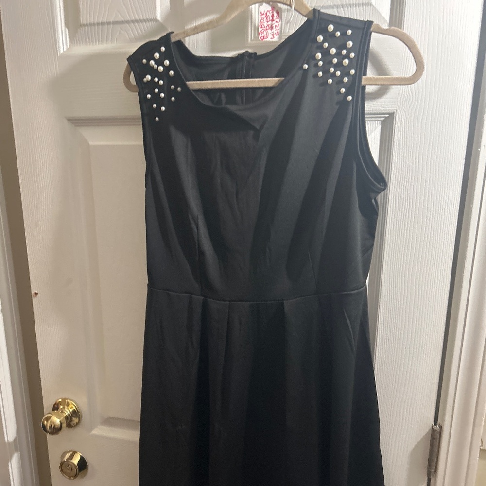 83) sheen black dress with pearls size large has a airline dress very cute
